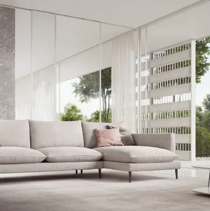Fabric sofa with peninsula Klint by Doimo Salotti.