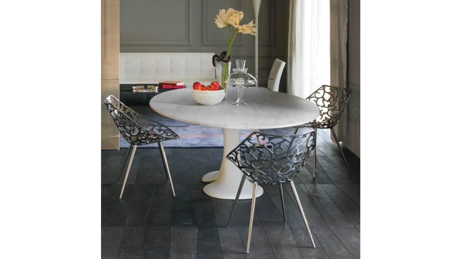 Miss Lacy chair in stainless steel by Driade.