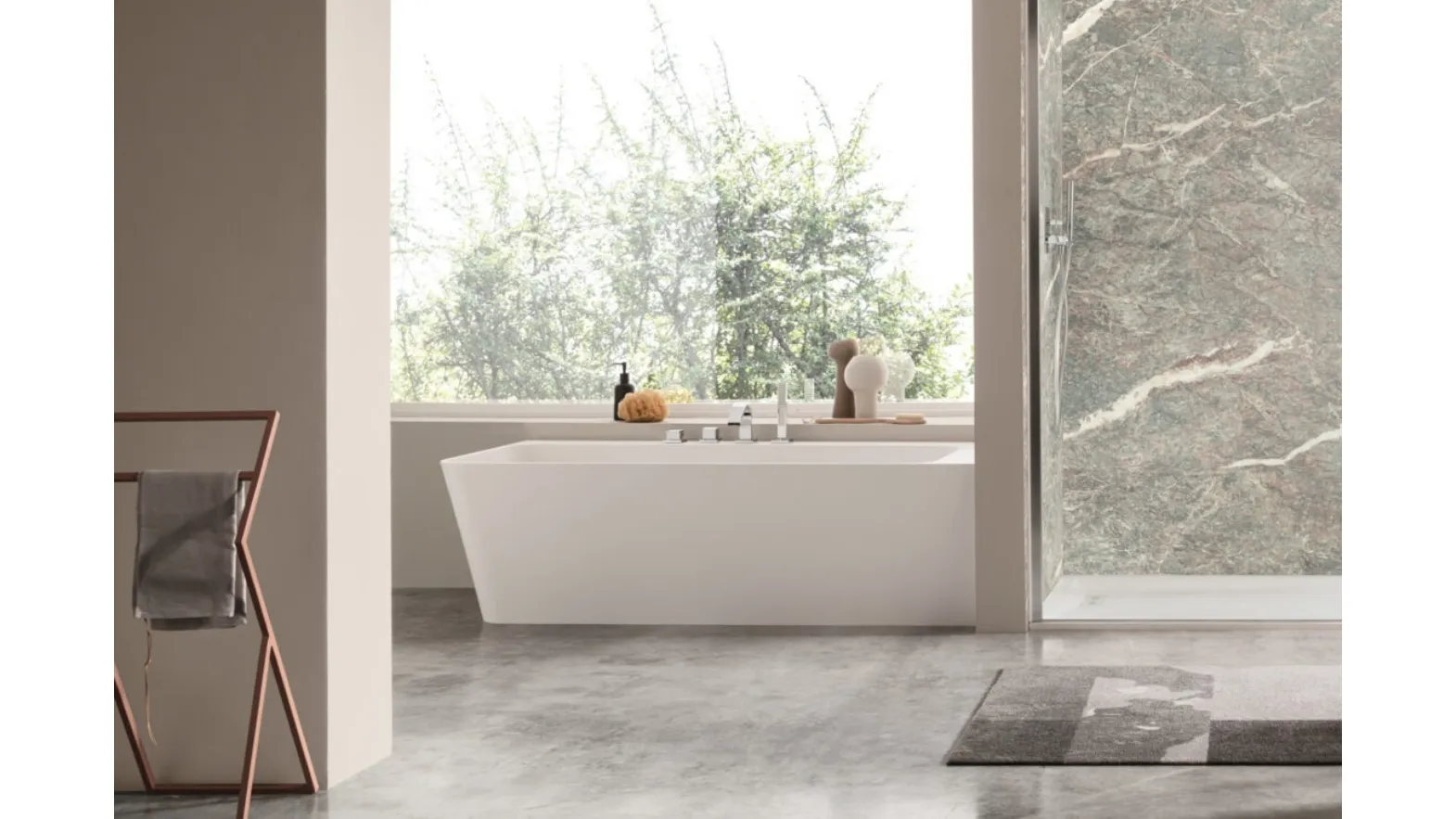 Eden corner bathtub by Arcom.
