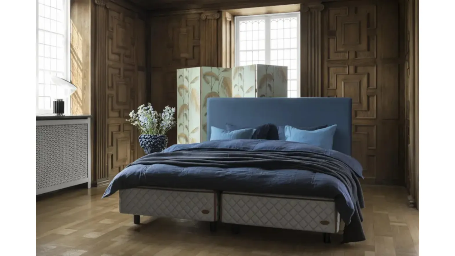 Bed with Astoria headboard by Duxiana