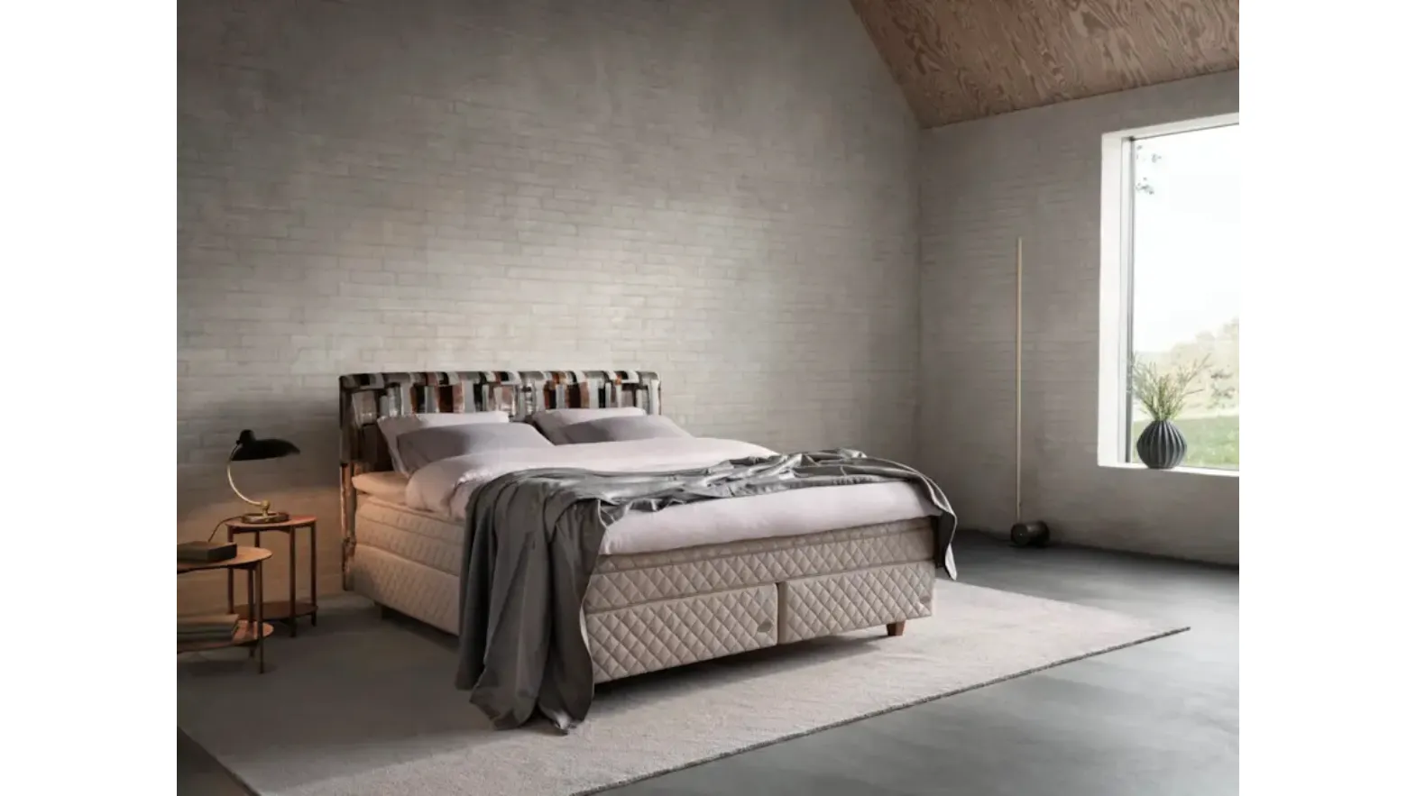 Bed with Astoria headboard by Duxiana
