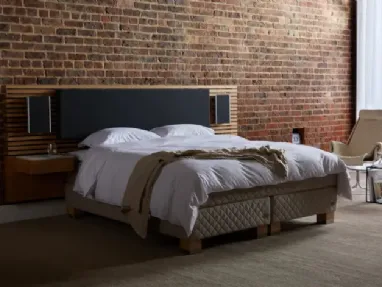 Bed with upholstered fabric and Duxiana wood headboard