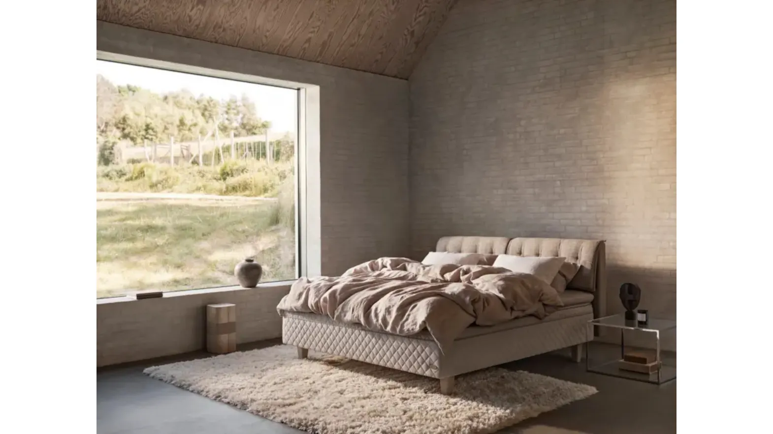 Bed with quilted fabric headboard by Duxiana