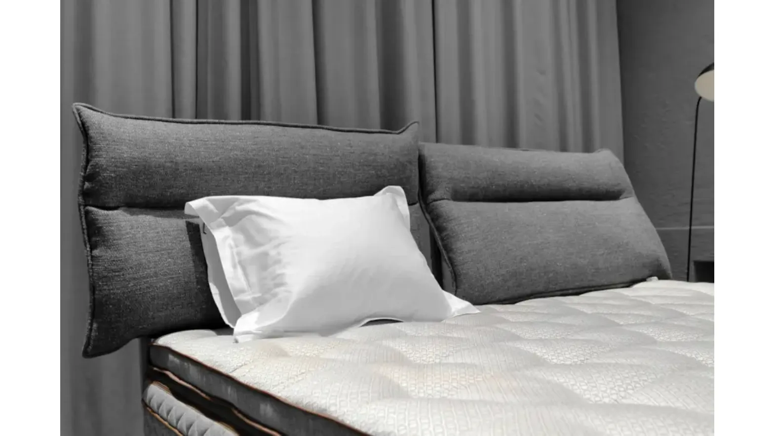 Bed with Flex Soft headboard by Duxiana