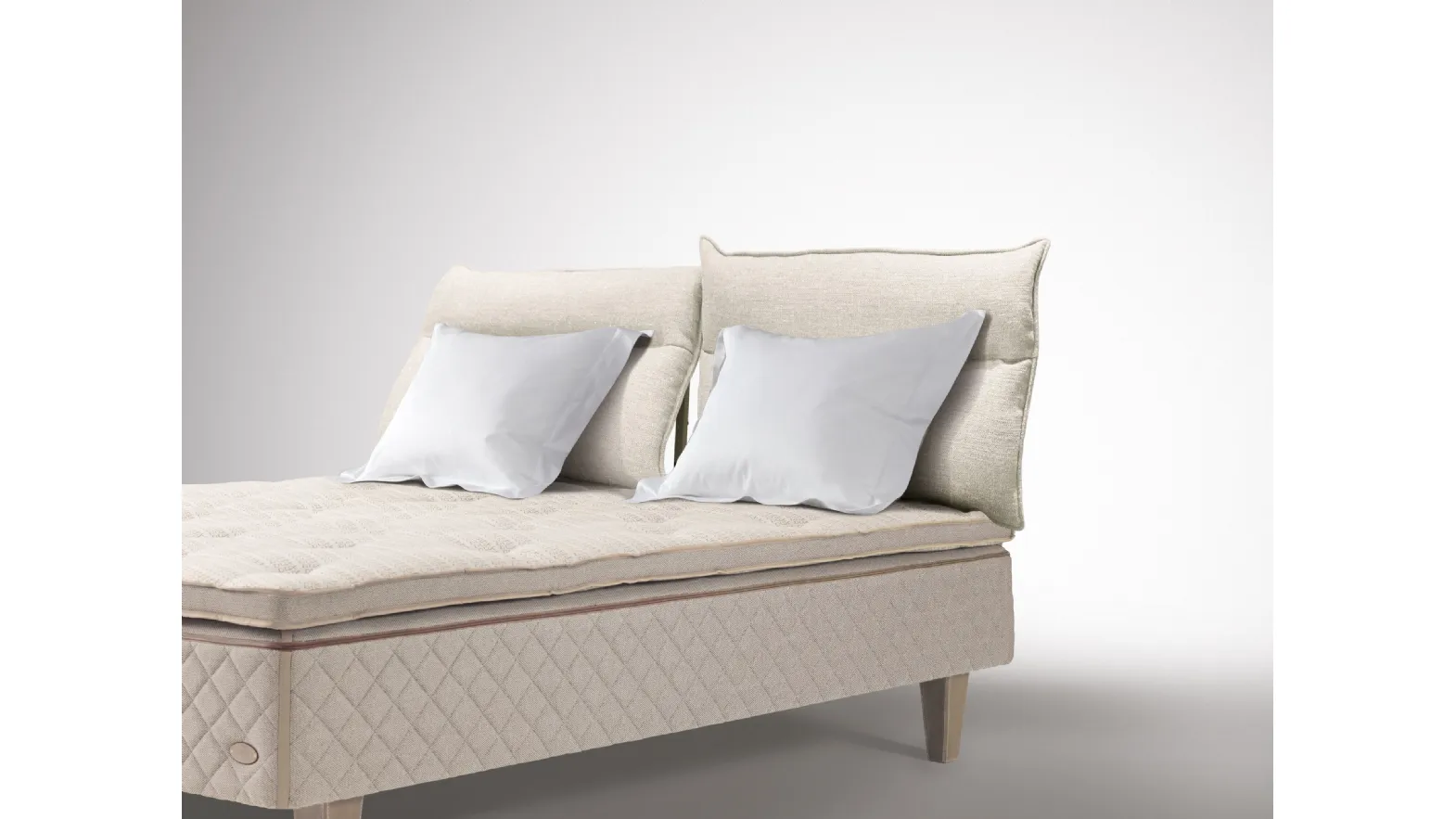 Bed with Flex Soft headboard by Duxiana