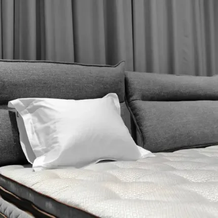 Bed with Flex Soft headboard by Duxiana