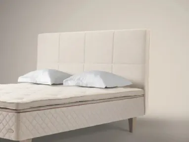 Bed with Quadro headboard by Duxiana