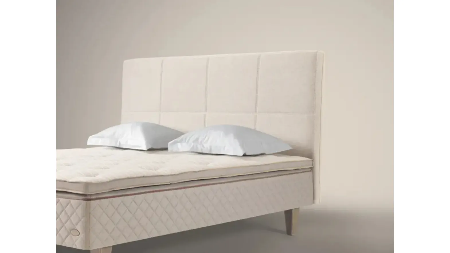 Bed with Quadro headboard by Duxiana