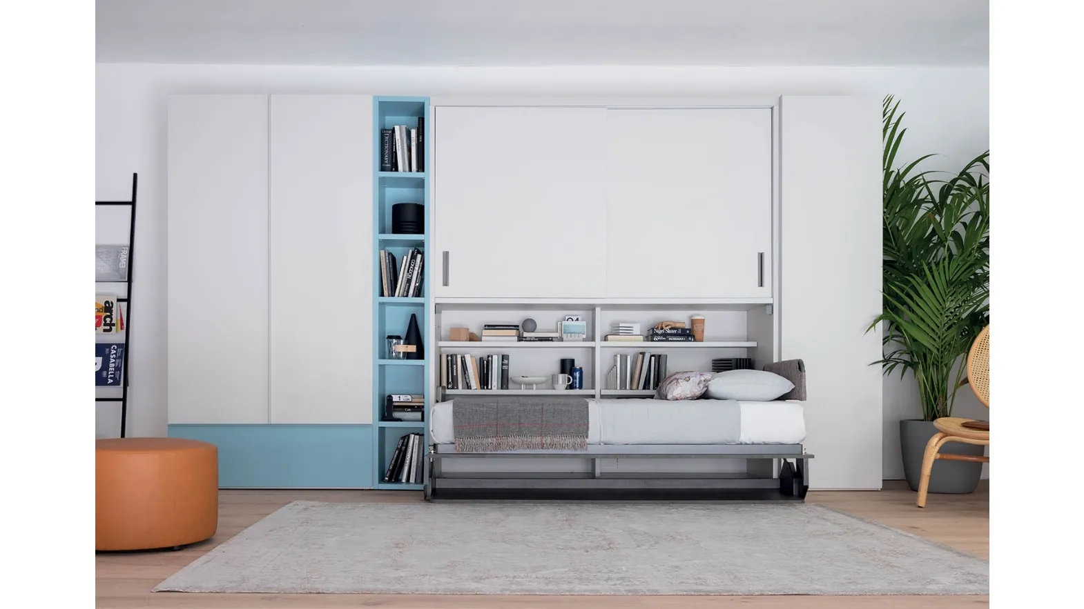 Single pull-out bed open with integrated desk in matte lacquer Hiro wardrobe by Clever.