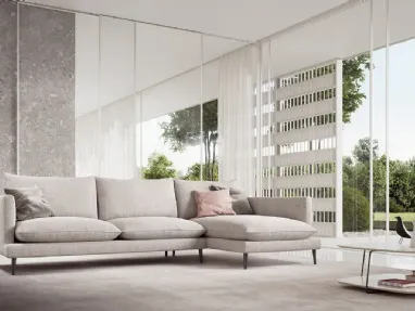 Fabric sofa with peninsula Klint by Doimo Salotti.