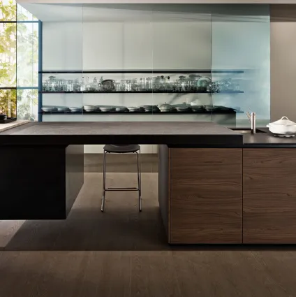 Freestanding kitchen made in wood with a dark finish by Dada