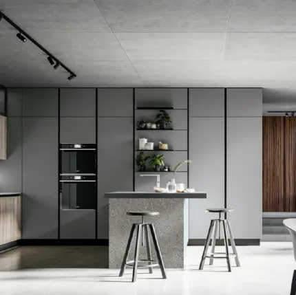 Modern kitchen with Round 04 peninsula in laminate and PET by Arredo3.