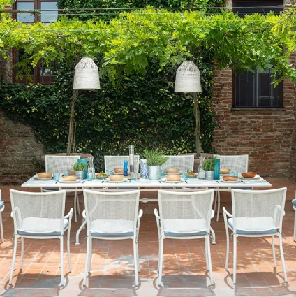 Table and chairs in steel Athena by Emu.